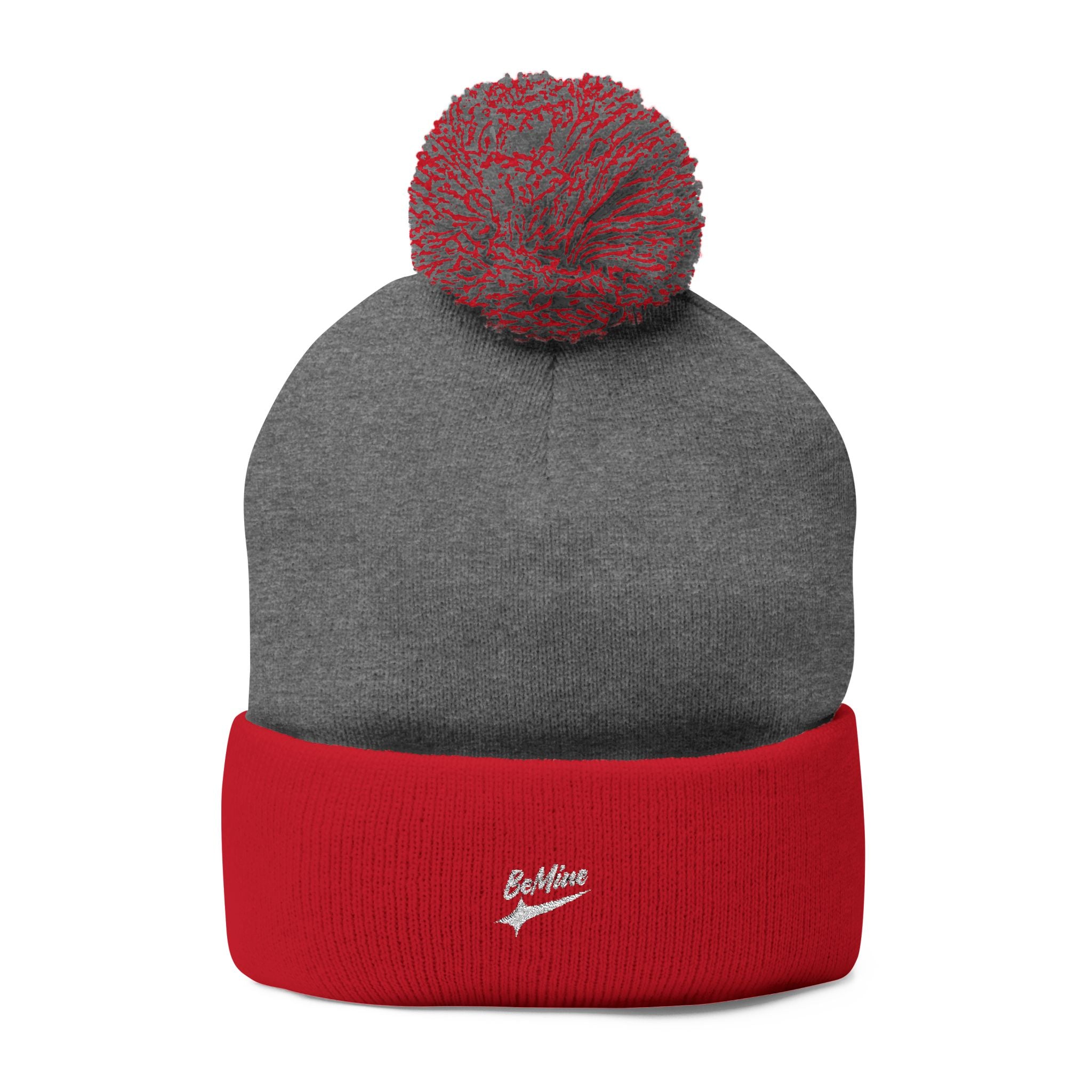 Bonnet tricoté à pompon brodé