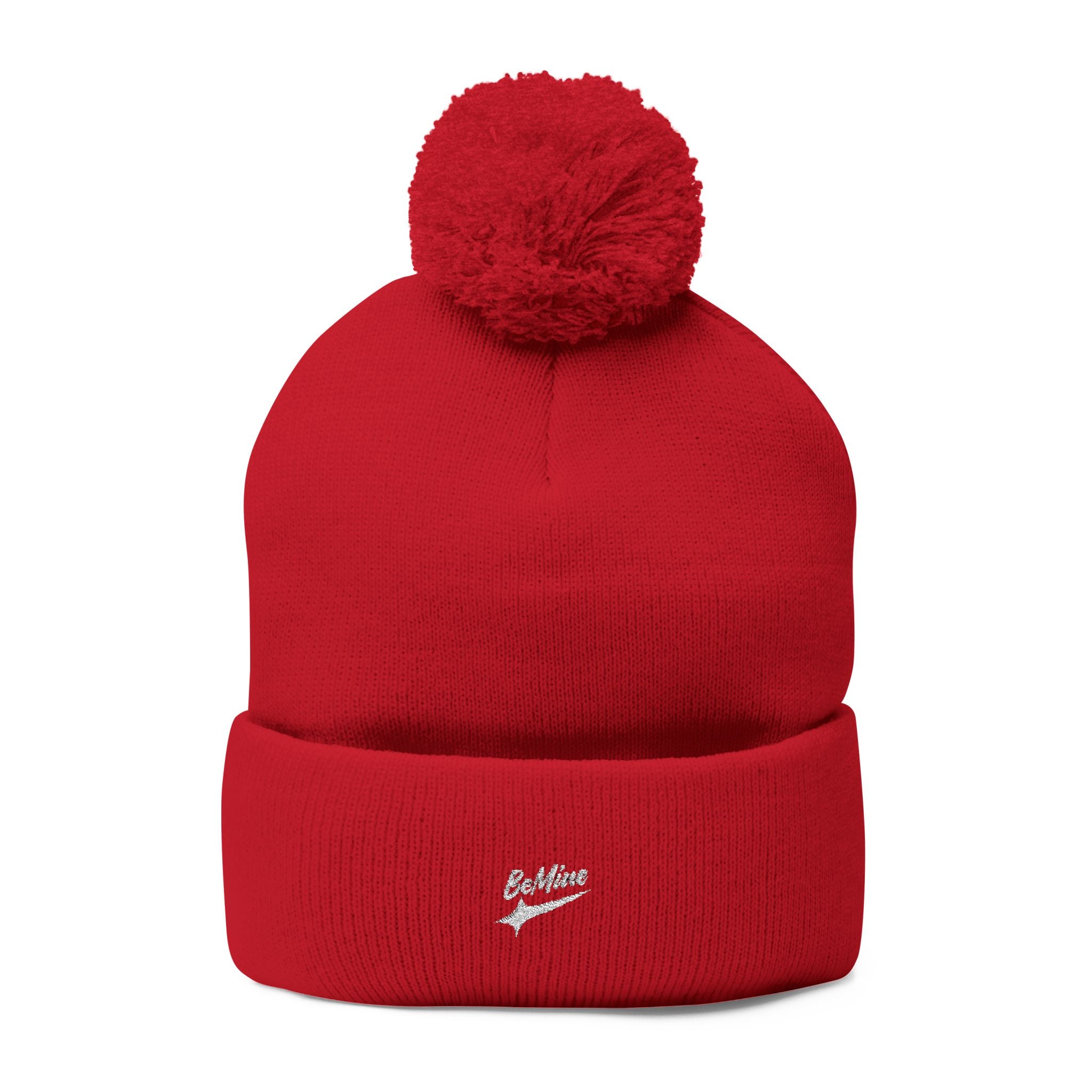 Bonnet tricoté à pompon brodé