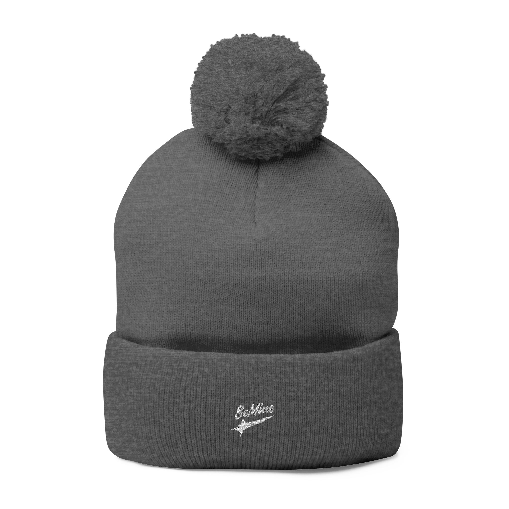 Bonnet tricoté à pompon brodé