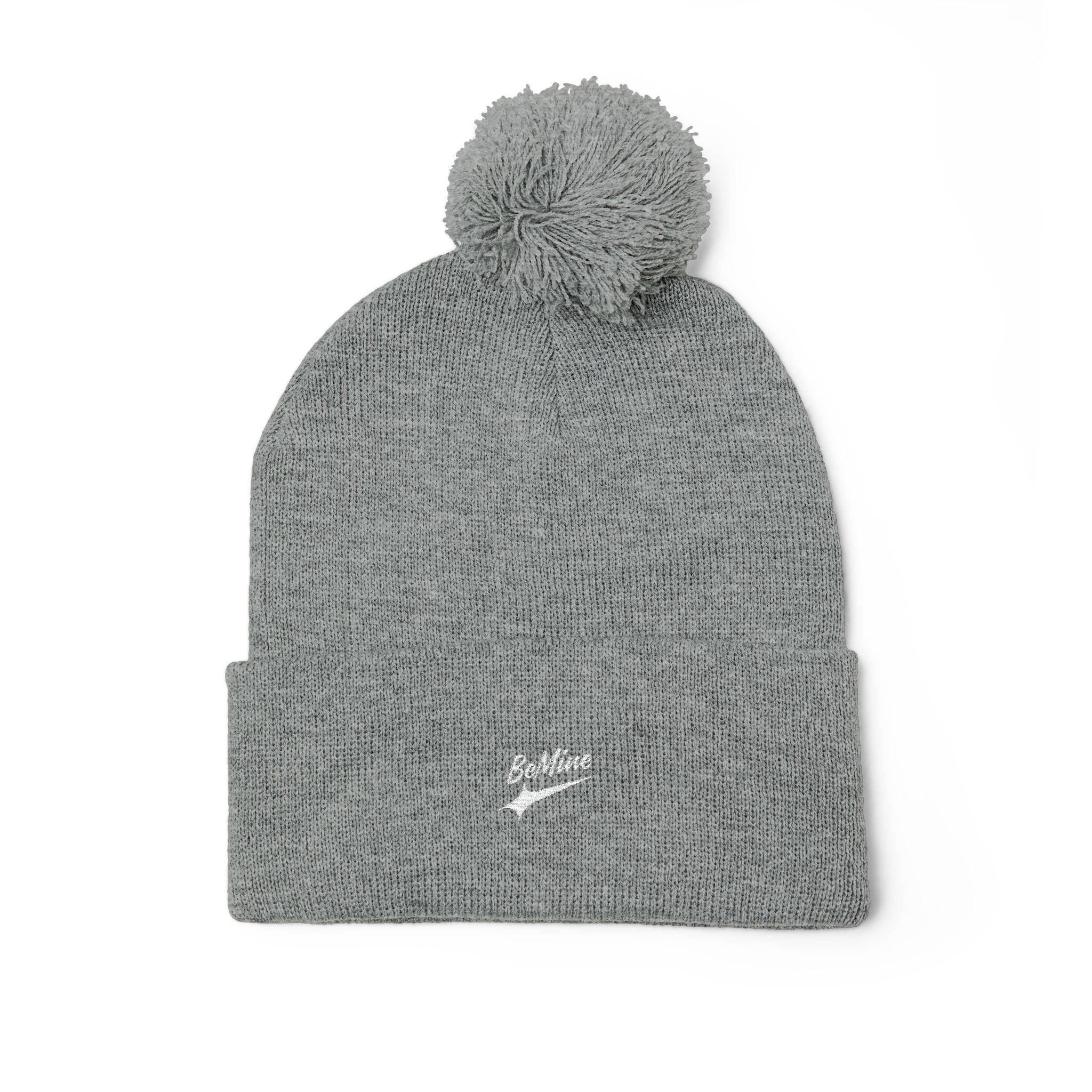 Bonnet tricoté à pompon brodé