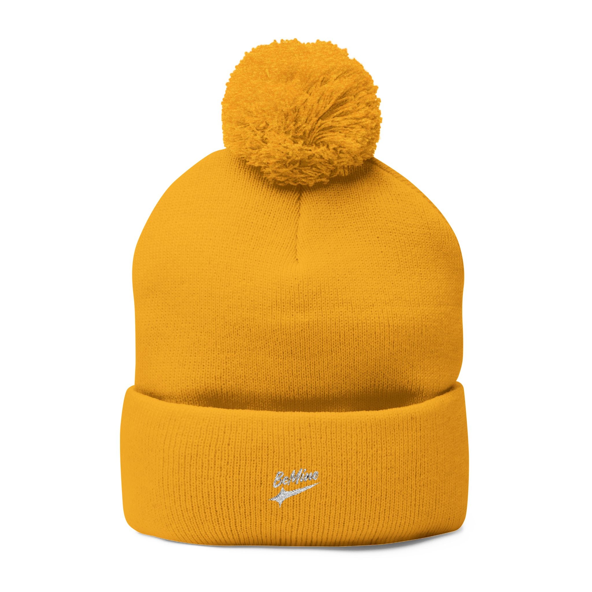 Bonnet tricoté à pompon brodé
